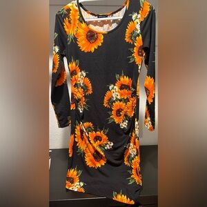 Long sleeve cinched sunflower bodycon dress. Similar to maternity dress